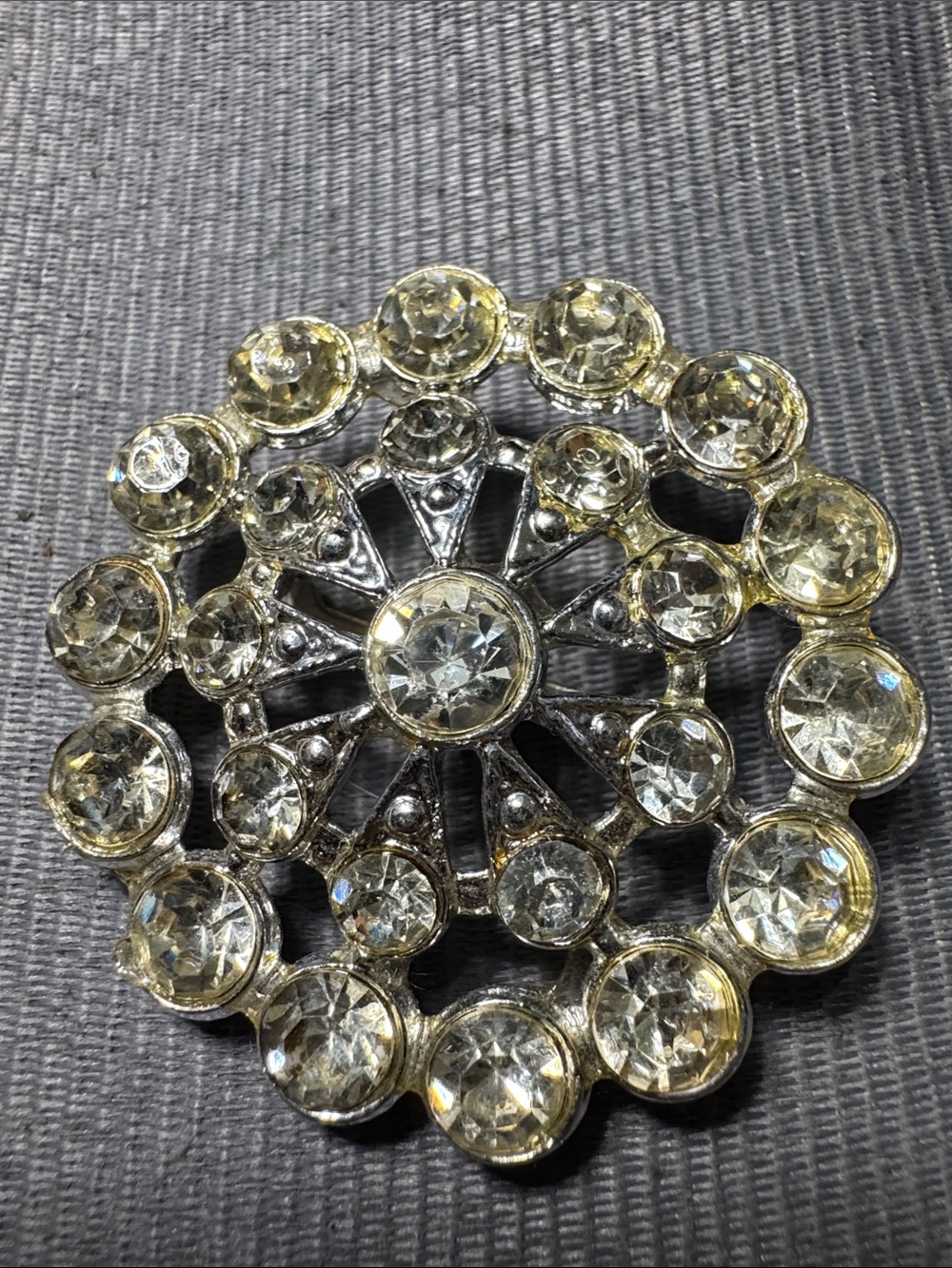 Vintage Source Unknown Silver-tone and Clear Crystal Floral Round Brooch